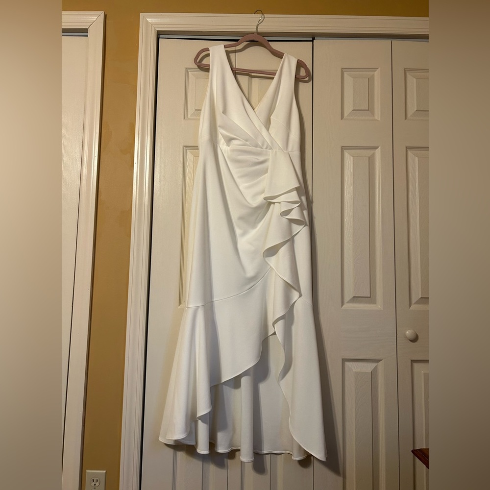 White A-line high/ low bottom ruffle gown